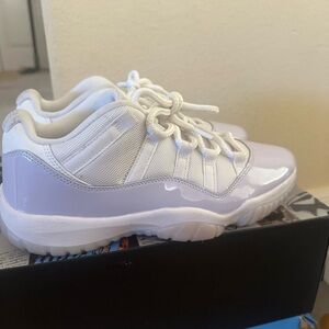 Air Jordan low 11’s White and Light Purple Sneakers